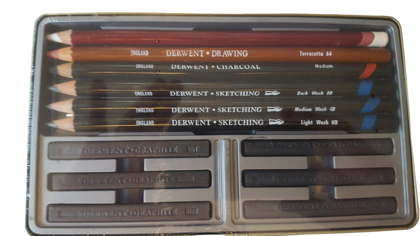 Set of charcoal pencils in a metal case