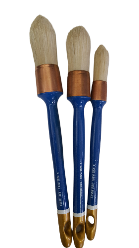 artist sash paint brushes with pointed shapes and blue handles with copper ferrules.