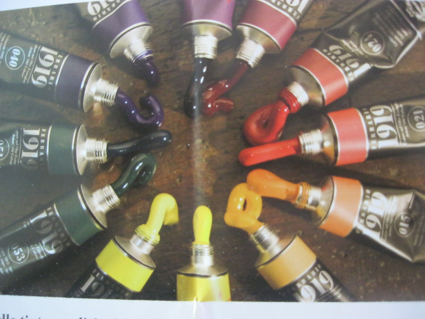 A collection of Ferrario 1919 Extrafine Artist Oil paint tubes in various colors.