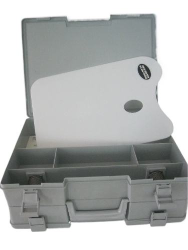 Art bin case opened to show the inside compartments, one side with a white palette and the other side with slots for brushes.