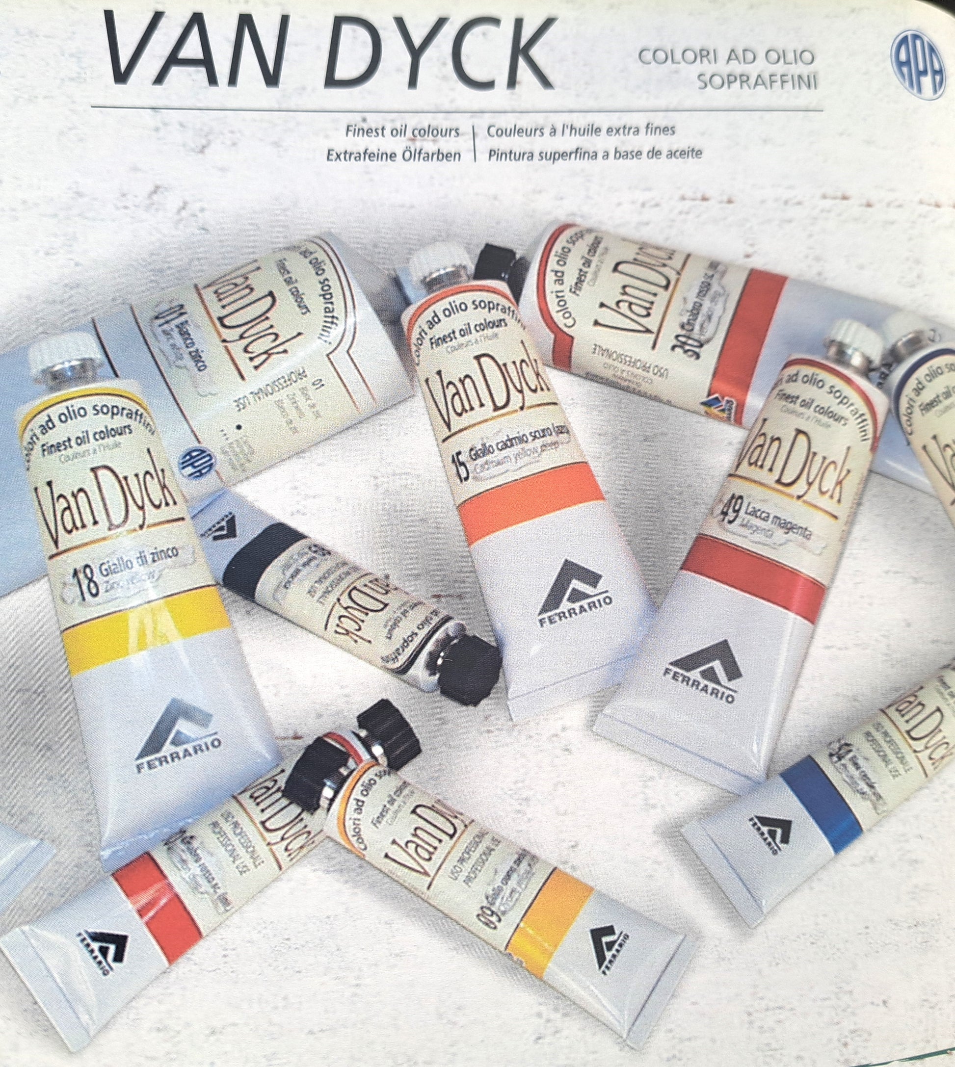 A collection of Ferrario Van Dyck oil paint tubes in various colors, labeled for artist use.
